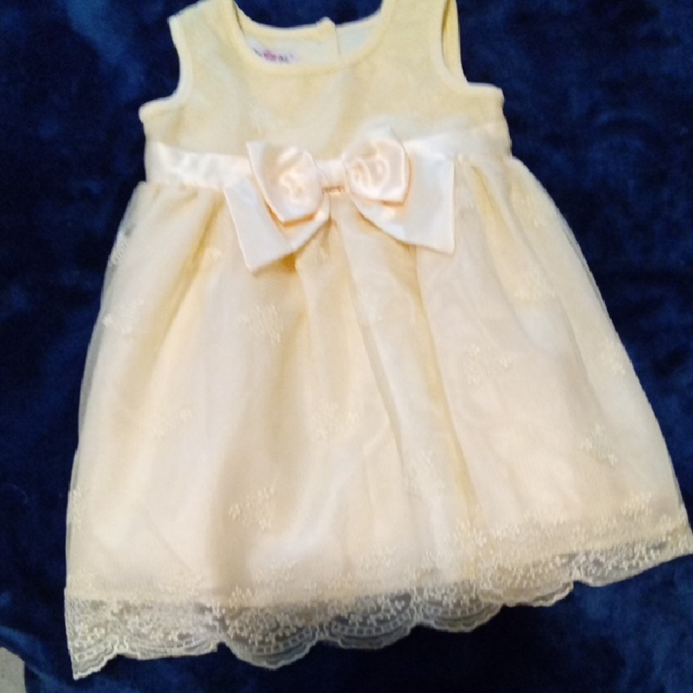 Charming Cream Sleeveless Kids Dress with Bow